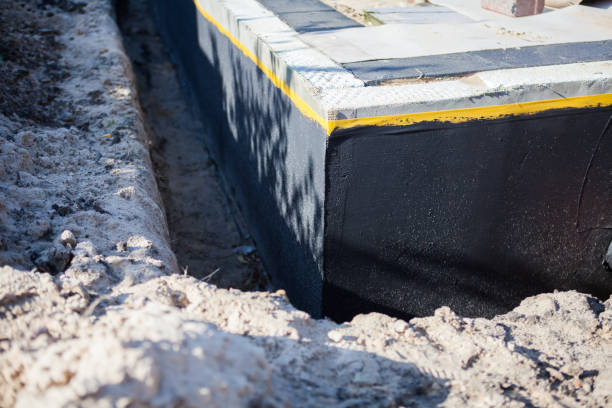 Professional Waterproofing technician working in La Grange, NC